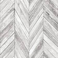 I don't want to use just one colour, and using two only really offers me a chequerboard pattern so i was thinking of adding a third or even fourth colour (the tiles are quite muted earthy colours). Grey Herringbone Wood Wallpaper Departments Diy At B Q Wood Wallpaper Grey Brick Effect Wallpaper Brick Effect Wallpaper