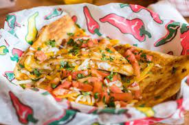 Begin by making the slaw, which is a combination of shredded red cabbage, chopped red onions, cilantro, apple cider vinegar. Sowal Lunchtime Red Fish Taco In Blue Mountain Beach Sowal Com