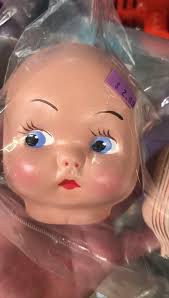 Bag of vintage baby doll faces. I definitely bought them and I’m definitely  going to do something creepy with them 😃