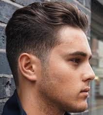 The taper fades hair at the neck and sideburns, leaving a defined arch behind the ear. Pin On Awesome