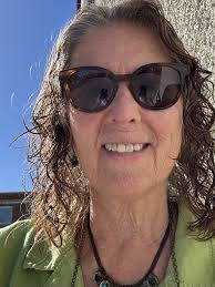 Tide pool smiley face in the sand