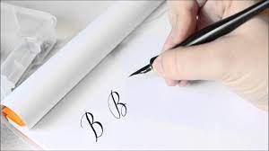 After this, create a swirl on the left hand side of the line, then curve it out to make the top of the letter of the humps on the b. The Letter B Basic Calligraphy Tutorial Youtube