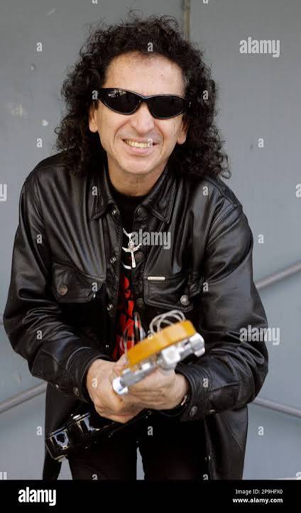 Alex Lora, lead singer of the legendary Mexican band El Tri, poses for a photo on Sunset Blvd., in Los Angeles, on Thursday, Oct. 16, 2008. El Tri will play on Saturday,