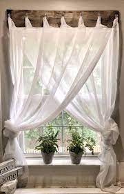 Explore classic fabrics like burlap, gingham, and plaid, or opt for reclaimed wood valances or shutters. Simple Farmhouse Window Treatments Maria Louise Design Farmhouse Window Treatments Curtain Decor Farmhouse Diy