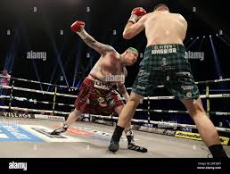 Jay McFarlane (left) and Nick Campbell in action during the Scottish  Heavyweight bout at the OVO Hydro, Glasgow. Picture date: Saturday February  26, 2022 Stock Photo