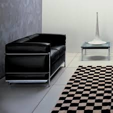 Large size with an iconic profile and design. Cassina Le Corbusier Lc2 Sofa Two Seater Ambientedirect