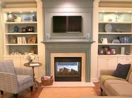 Amy casablanca fireplace book shelves. How To Make Your Tv Blend In Over The Fireplace Fireplace Bookshelves Transitional Decor Bedroom Fireplace Bookcase