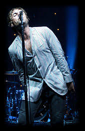 He has been brought up almost entirely by fiona and the rest of his siblings. Liam Gallagher Wikipedia