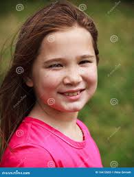 Young girl smiling stock image. Image of blow, water