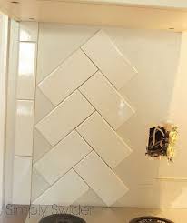 Subway Tile Back Splash In A Herringbone Pattern Kitchen Backsplash Tile Designs Backsplash Tile Design Herringbone Backsplash