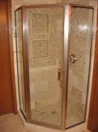 The enclosure features clear glass door and panels with chrome finish hardware. Semi Frameless Neo Angle Shower Enclosure With 6 Pull Handle Brushed Nickel Hardware And Neo Angle Shower Doors Shower Enclosure Neo Angle Shower Enclosures