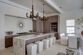 This is when the surface cascades down the entire face or even both faces (front and back). Long Kitchen Island With White And Gray Marble Waterfall Countertop Cottage Kitchen