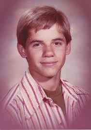 The bloke in the center of the pic, playing guitar, gave me my first very  own punk records, my first studded wristband and my first "Destroy" tee. To  me he was an