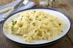 What is the best way to reheat leftover fettuccine alfredo?