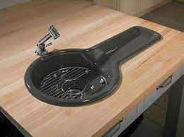 This small kitchen sink features a modern faucet design and a stunner sink design. 22 Unique Kitchen Sinks Personalizing Modern Kitchen Design With Shape Material And Color