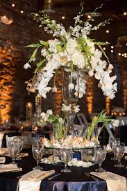 Modern White Orchid Cascade Centerpieces White Wedding Centerpieces Orchid Centerpieces Wedding Wedding Flower Arrangements Fall