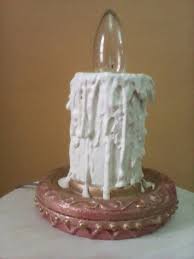 مصباح على شكل شمعة cake food desserts