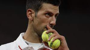 Tennis star djokovic sings in support of red star. Djokovic Faces Off With Federer Fan At Roland Garros Junipersports