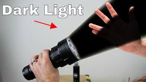Image result for flashlight shining black light
