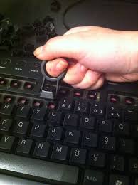 Hold the keyboard upside down and tap it gently to remove loose dirt and other debris. Clean Your Keyboard Diy Cleaning Products Cleaning Household Hacks