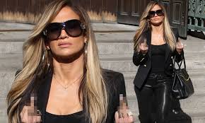 Jennifer lopez is a divine queenpin in 'hustlers'. Jennifer Lopez Defiantly Flips The Bird While Filming Courthouse Scene On The Nyc Set Of Hustlers Daily Mail Online
