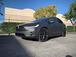 Tesla model x matte black. Signature Custom Wraps Darth Vader Ev Designmovement Tesla Model X