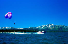 With an experienced crew, you'll enjoy an exhilarating and safe. Photo 80421 Parasailing High Above Lake Tahoe America S Byways