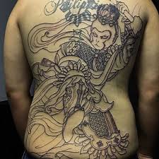 Gollum the hobbit, the lord of the rings character sculpture of gollum catching fish at wellington airport, 2013, to mark the release of the hobbit: The Greville Inn Tattoo Studio Horitsugutattoo Started This Huge Monkey King