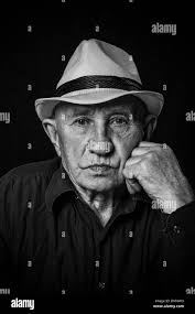 Wearing cowboy hat Black and White Stock Photos & Images