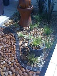 Making a rock garden is one of the most fun and creative forms of gardening. Make Your Garden Space Peaceful Plant Rocks Rock Garden Landscaping Landscaping With Rocks Rock Garden