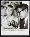Singer Sammy Davis Jr. holds the hand of his bride, actress May ...