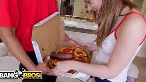 Pizza with big black sausage in the middle