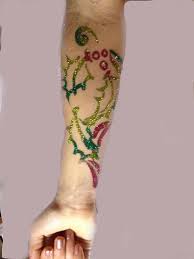 Cool dots tattoo on finger. Glitter Tattoos For Christmas Party Entertainment Ideas Inc