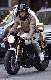 Ryan Reynolds Looks Stylish In Leather Jacket And Cargo Pants Triumph Cafe Racer Cafe Racer Bikes Cafe Racer Motorcycle