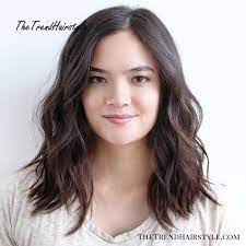 This messy short pixie cut for thick hair round face is all about charming and composed looks to give a cheerful appearance. Long Layers With Cappuccino Highlights 20 Jaw Dropping Long Hairstyles For Round Faces The Trending Hairstyle