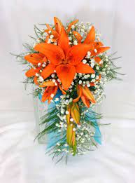 Orange tiger lily wedding bouquets. Bridesmaid S Cascade Style Bouquet Orange Lilies Babies Breath With Teal Rib Flower Bouquet Wedding Babys Breath Bouquet Wedding Cascading Wedding Bouquets