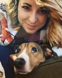 Four year old finds long dog in photo