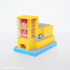 Use long, narrow pieces to construct the handle of your slide, which will be a 1x1 block smaller than your reservoir so that your slide can fit inside your machine. How To Build A Lego Candy Machine Dispense One Candy At A Time Frugal Fun For Boys And Girls