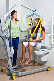 With the legs of the base open and locked, use the steering handle to push the patient lift into position. Hygiene Sling Surehands