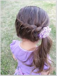 Another little flower girl hairstyle with long hair is the side braid in a low bun. 136 Adorable Little Girl Hairstyles To Try