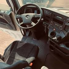 السلام عليكم ورحمة الله للبيع بحالة ممتازة شاحنه مرسيدس اكتروس 1845mp4 موديل 2013 رقم العرض هو 519133 الجير بوكس ثنائي عايدي Steering Wheel Wheel Vehicles