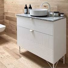 Superwhite Vanity In Parallels Pattern Enamel Sink From Alape Slender Low Legs And Holy Wafer Handles In White The Vani Ikea Frames Bathrooms Remodel Vanity