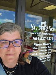 The Quilt Peddler shop hop and antique quilt display