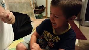 CUTE VIDEO: Boy cries when dad 'gets' his ear