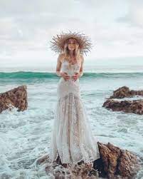 26 Beach Wedding Dresses That Wow Wedding Dresses Beach Wedding Dress Wedding Dresses Strapless