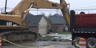 massive sinkhole in fraser, michigan