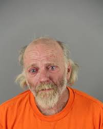 Mark Baker has been charged allegedly with strangulation and suffocation,  battery, criminal damage to property, intimidate domestic abuse victim, and  stalking resulting in bodily harm. He is currently being held