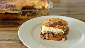 Layerrs of vegetables with tomato sauce, topped with cheesy bechamel. How To Make Greek Moussaka Youtube