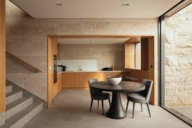 Lorraine extending dining table a serpentine metal support brace adds a distinctive flourish to this table's rustic good looks. Clifftops By Morrow Lorraine Hotel Interiors