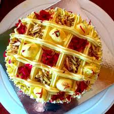 Rasmalai cake is made of very commonly available, basic ingredients like flour, semolina (sooji), sugar, cooking oil, yogurt, cream and milk. Rasmalai Cake With Dry Fruits Delivery Available In Jaipur Ajmer Kota